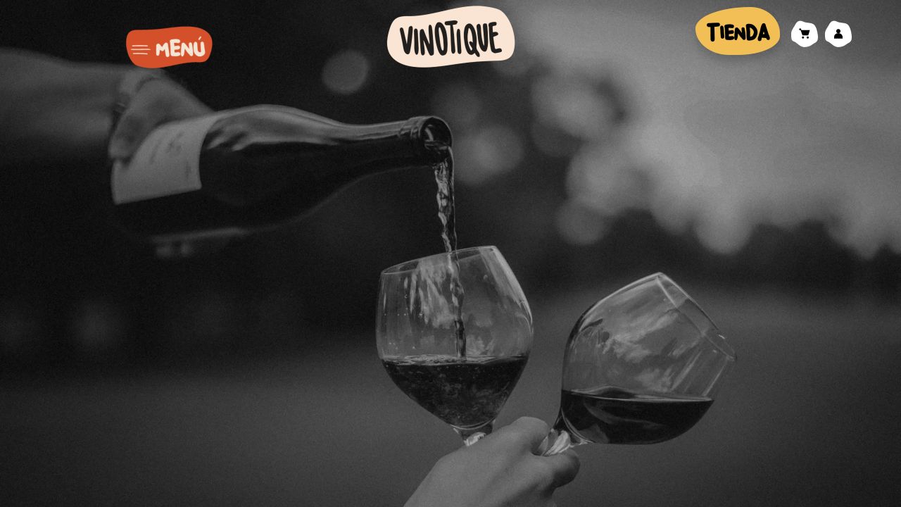 Web de Vinotique: logo, menú, tienda y portada con dos copas de vino